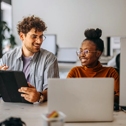 coworkers working together in office