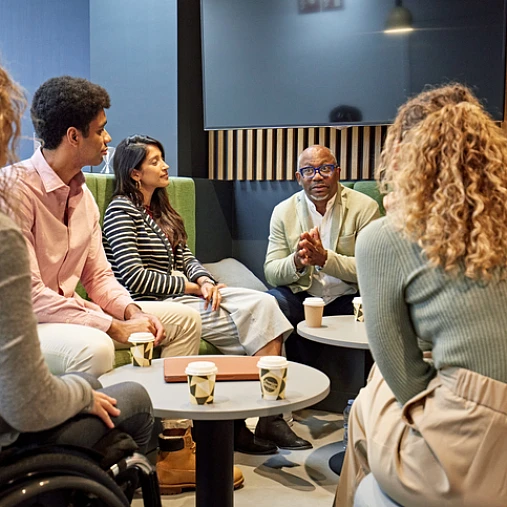 diverse group of colleagues having a meeting
