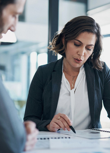 woman looking through cover letter