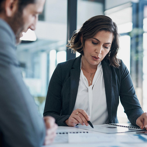 woman looking through cover letter