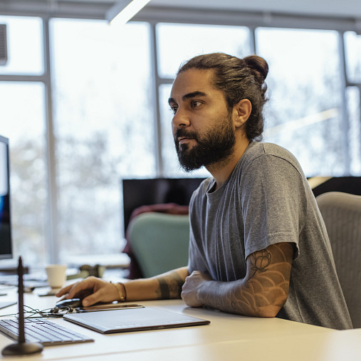 man working at computer