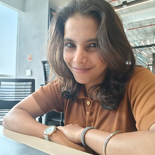 Sakshi working at her desk