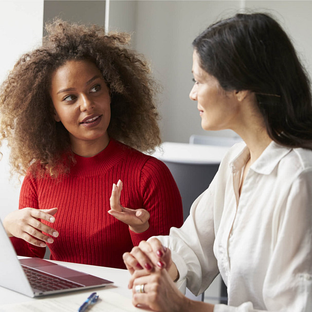 cowokers talking to each other about burnout