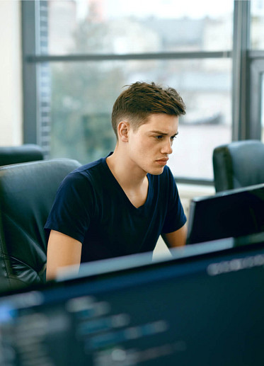 man working in first tech job