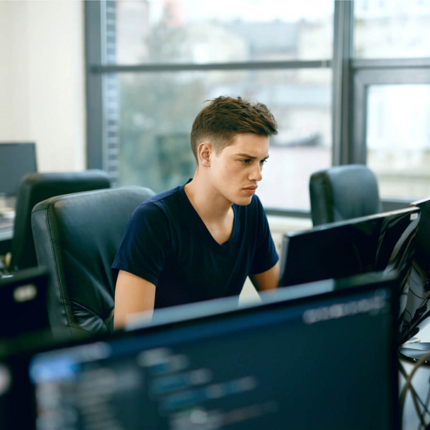 man working in first tech job