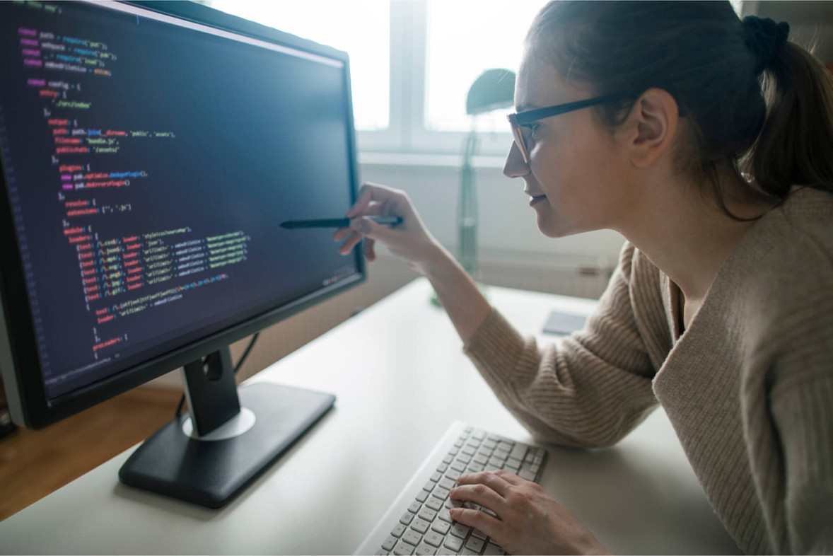 woman learning best coding languages for beginners