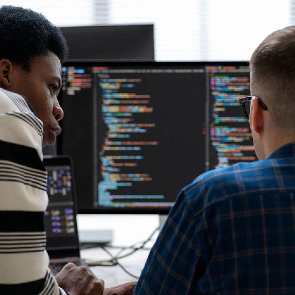coworkers discussing ai in the workplace