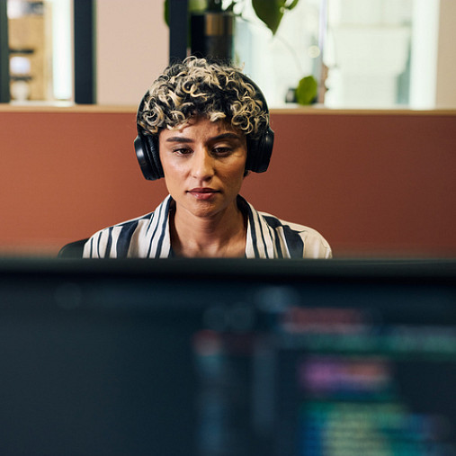 cyber analyst working at desk